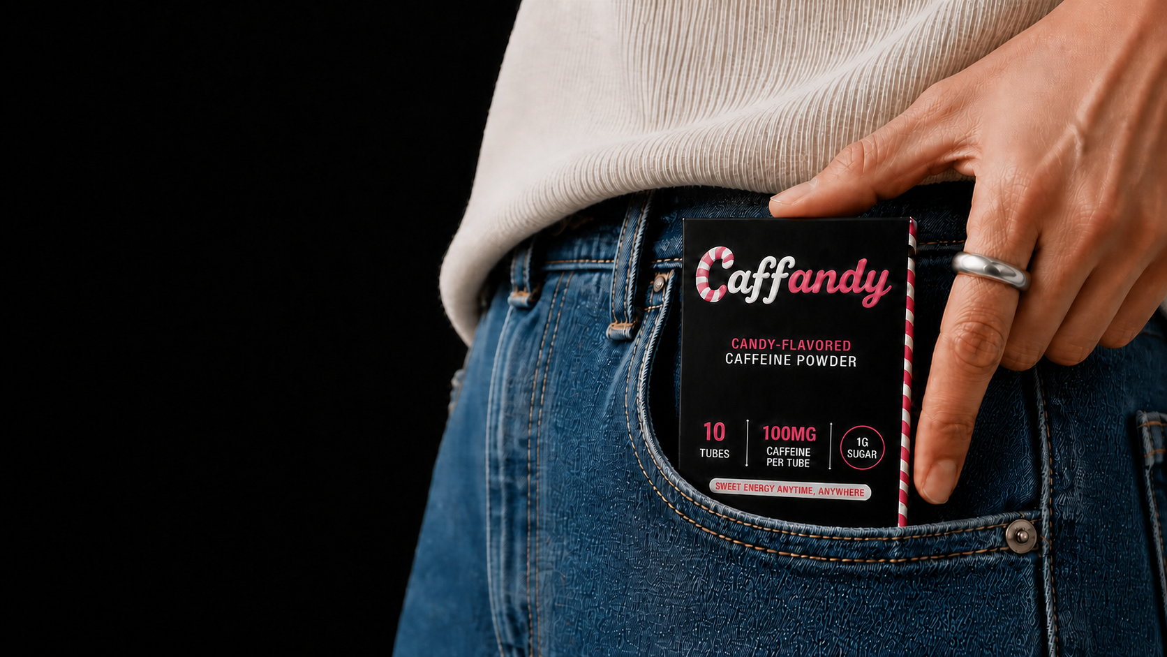 Small CAFFANDY carton sliding into a front jeans pocket
